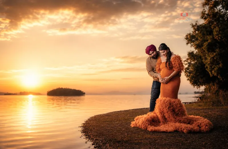 Couple maternity photoshoot at sunset in Asansol by Candid Clicks