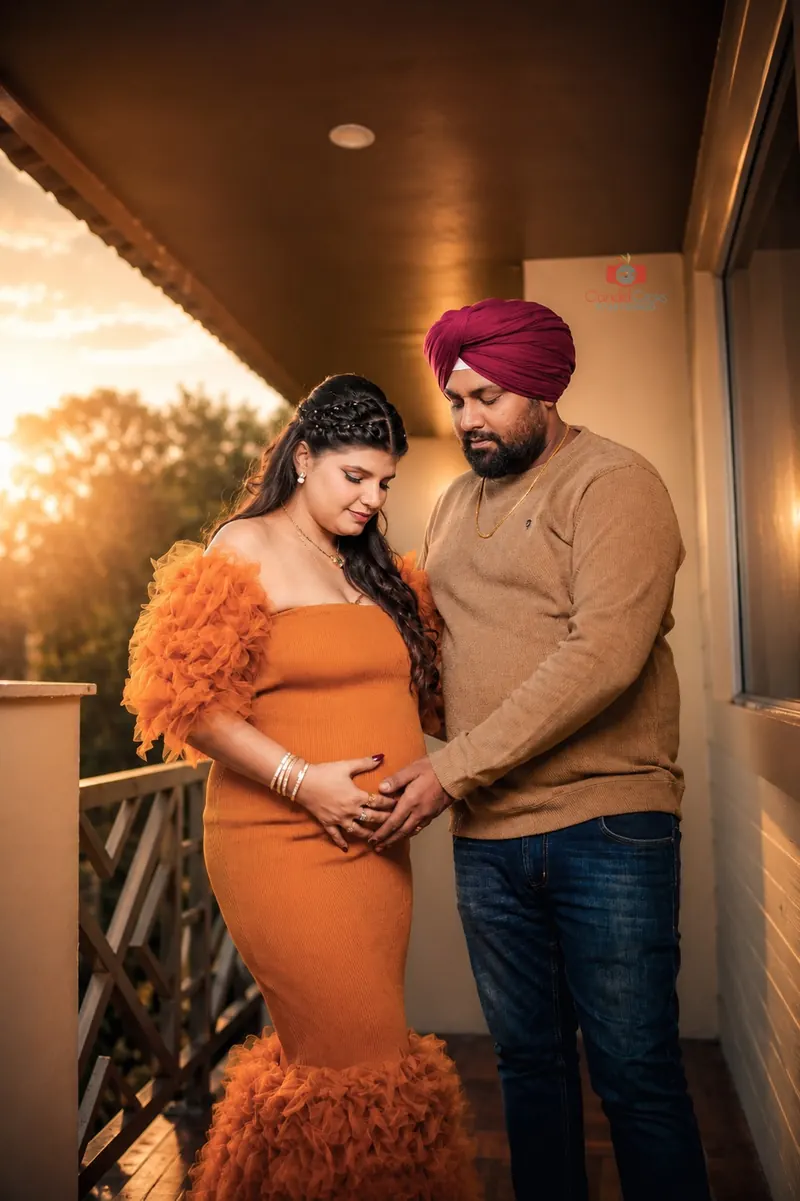 Family maternity portrait celebrating pregnancy by Candid Clicks